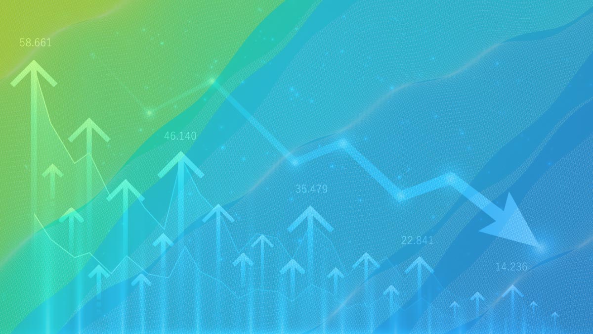 Declining market trend illustrated by a downward line chart on an abstract blue and green background representing softening insurance market conditions.